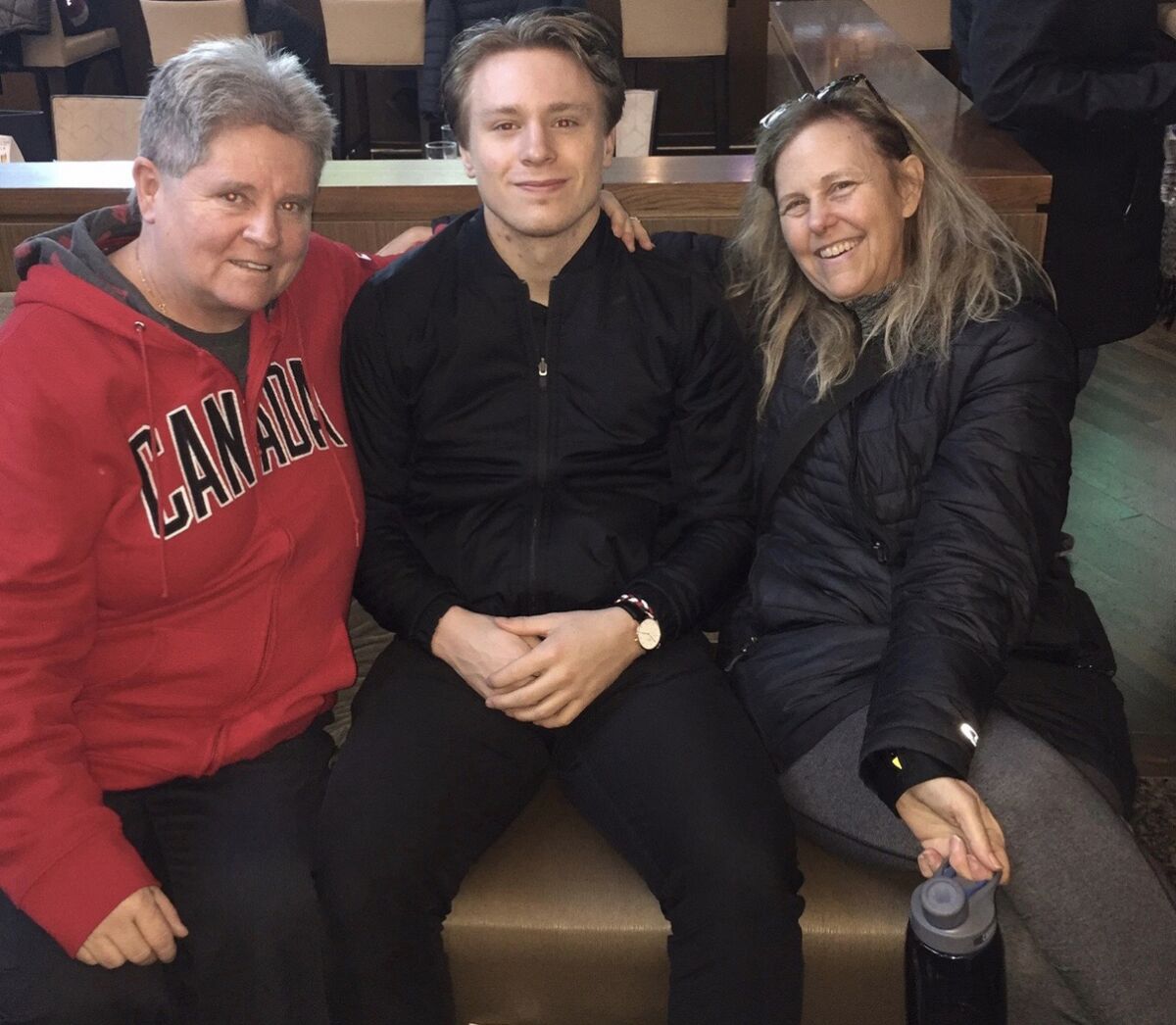 Kings hockey player Jaret Anderson Dolan and his two moms, Fran, left, and Nancy.