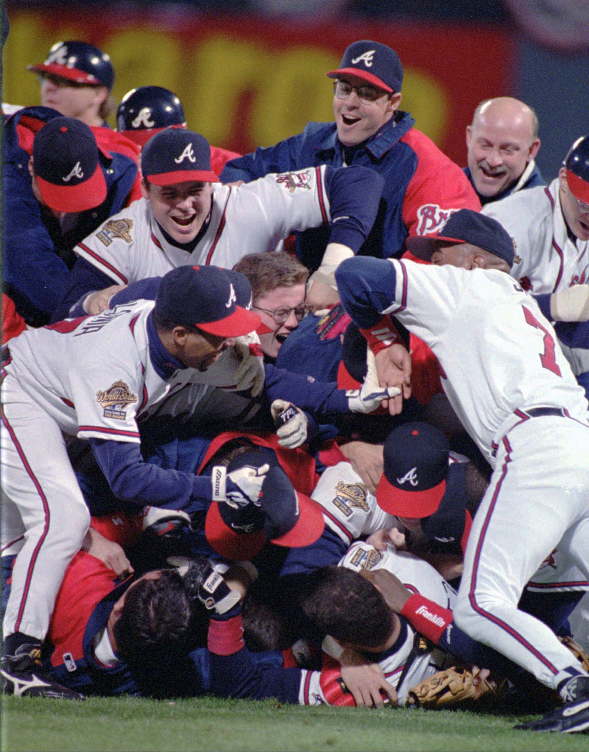 The Atlanta Braves celebrate after defeating the Cleveland Indians in Game 6 of the 1995 World Series.