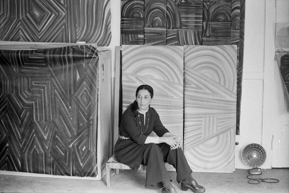 Luchita Hurtado sits amid abstracted works inspired by words in Santa Monica in 1973.