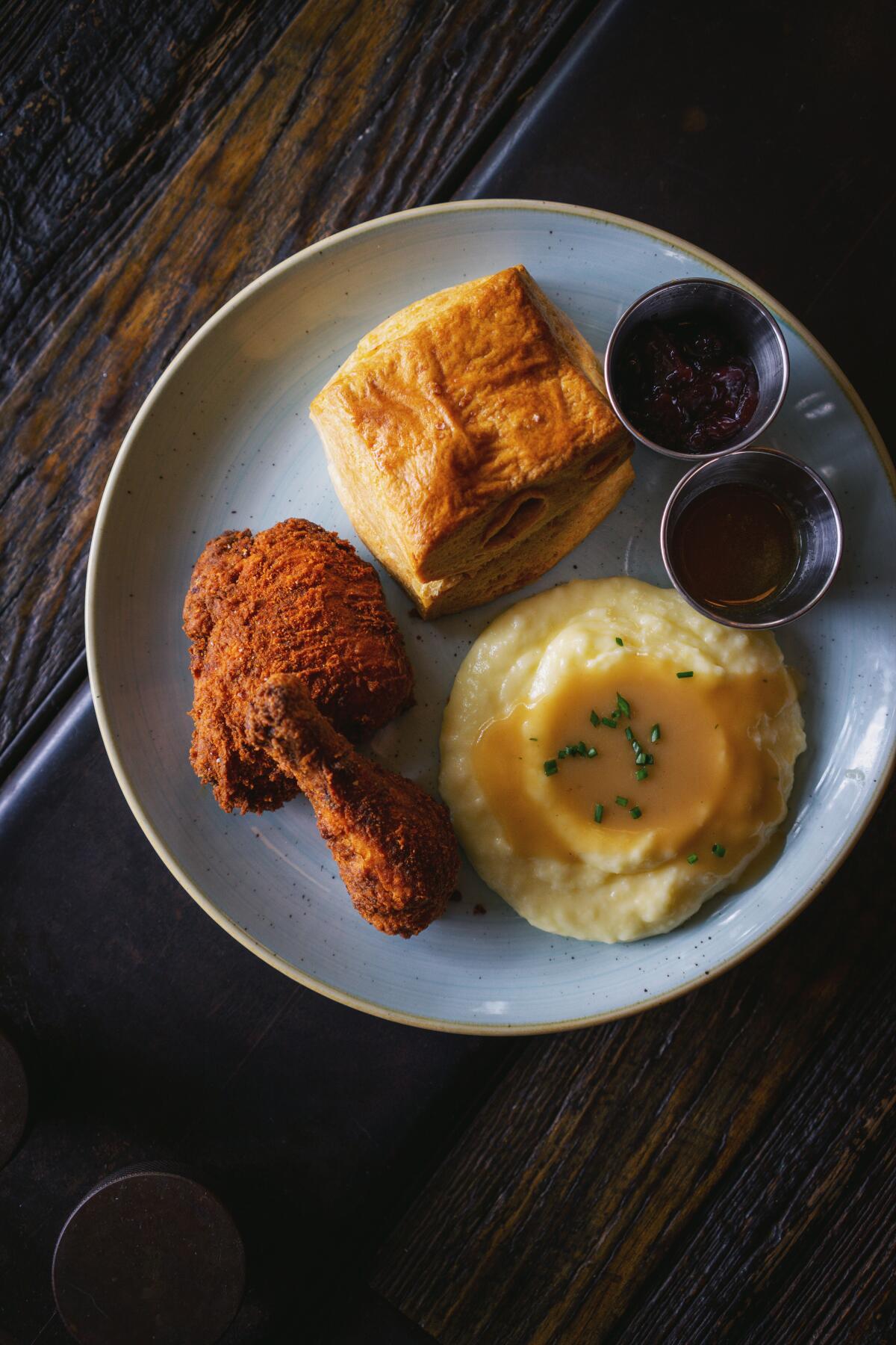 A photo of the two-piece fried chicken combo meal from Craft & Commerce