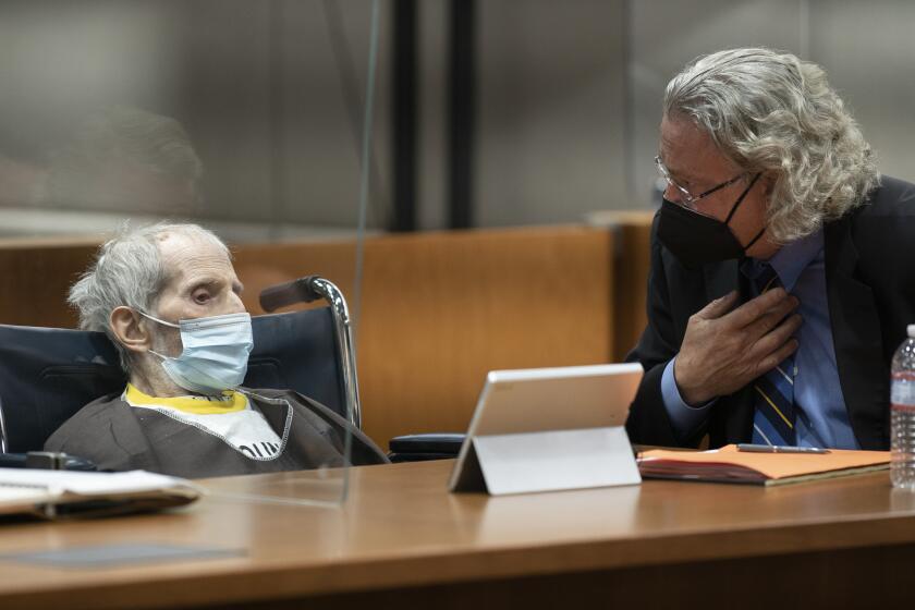 LOS ANGELES, CA - OCTOBER 14: Robert Durst, seated with defense attorney David Chesnoff, was sentenced on Thursday, Oct. 14, 2021 at the Airport Courthouse, to life without the possibility of parole for killing Susan Berman.(Myung J. Chun / Los Angeles Times)