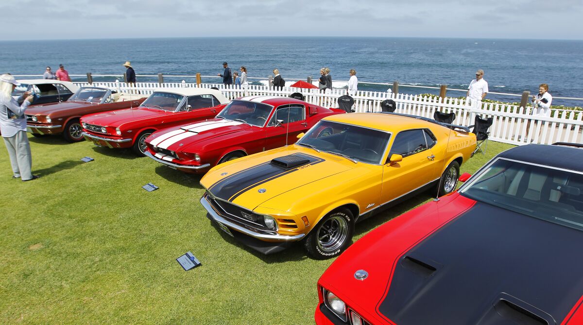 Ford Mustangs are lined up at the La Jolla Concours d'Elegance car show in April 2019.