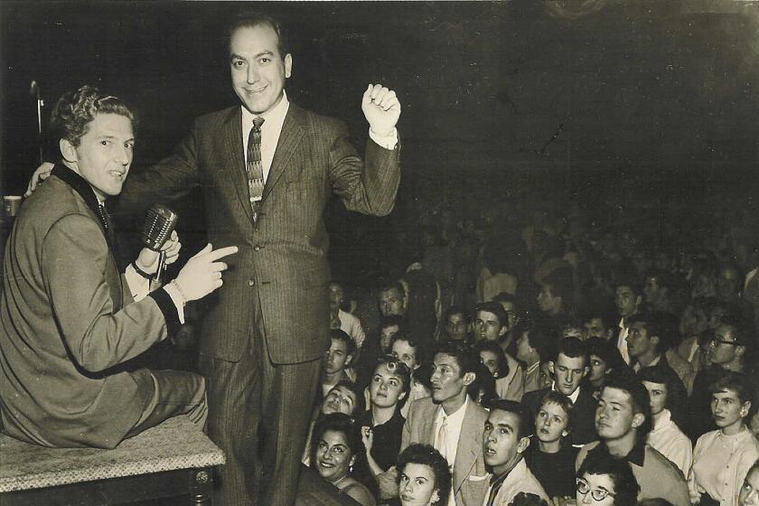 1950s. Jerry Lee Lewis and Art Laboe at the El Monte Legion Stadium