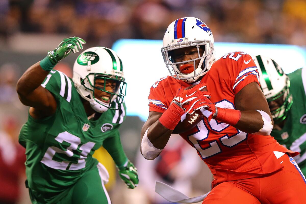 Buffalo's Karlos Williams beats New York Jets' Marcus Gilchrist to score a touchdown on Nov. 12.