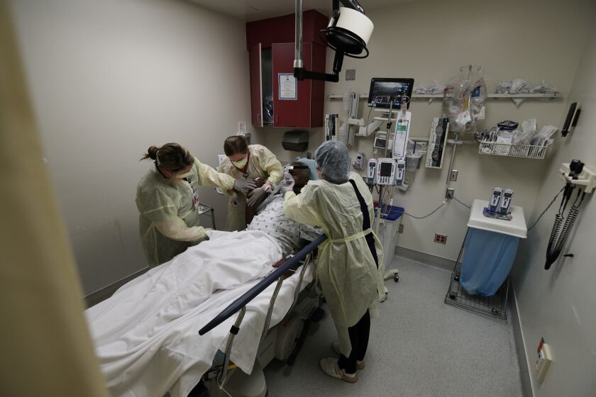 MORENO VALLEY, CA - MAY 15, 2020: First responders in the ER and the ICU at RUHS dealing with COVID-19 victims and trauma victims in Moreno Valley, CA on May 15, 2020 in Moreno Valley, California. (Gina Ferazzi / Los Angeles Times)