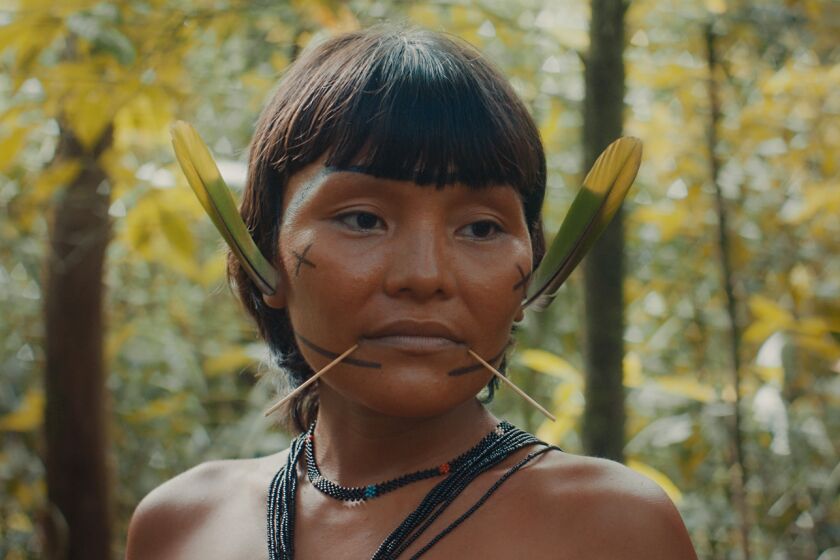 A member of the Amazon’s Yanomami tribe in Luiz Bolognesi’s 2021 documentary “The Last Forest.”