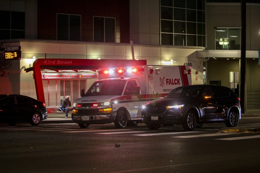  A Falck ambulance speeds along El Cajon Boulevard on  Jan. 5, 2022 in San Diego. 
