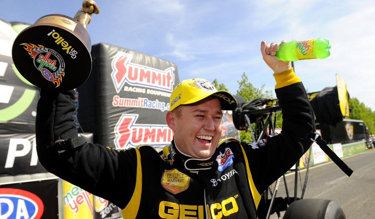 Drag racer Richie Crampton celebrates after winning the top fuel division at Old Bridge Township Raceway Park on Sunday.