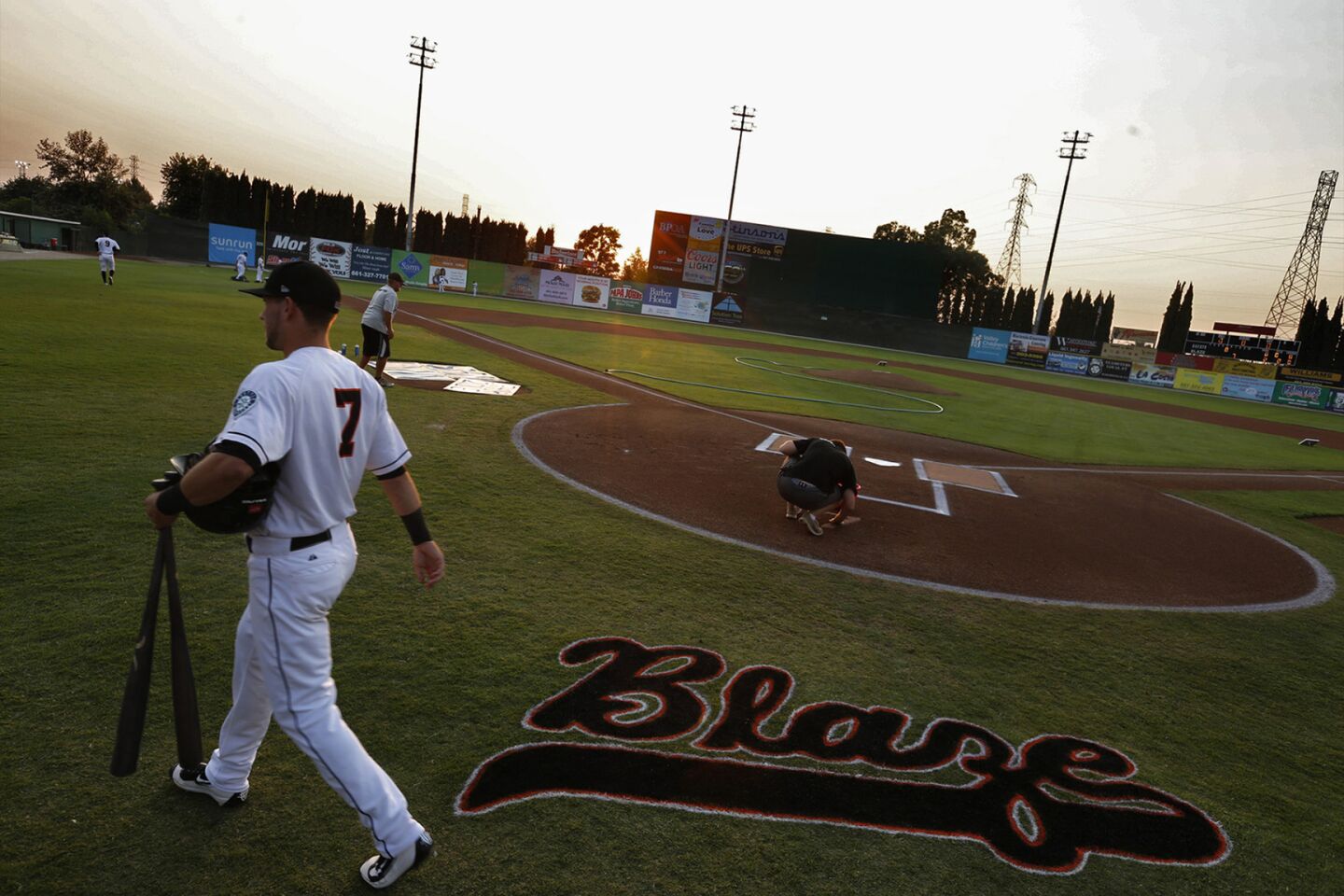 Bakersfield Blaze infielder Justin Seager walks on to the durgoutbefore the start of a gameagainst the Stockton Ports at Sam Lynn Ballpark.
