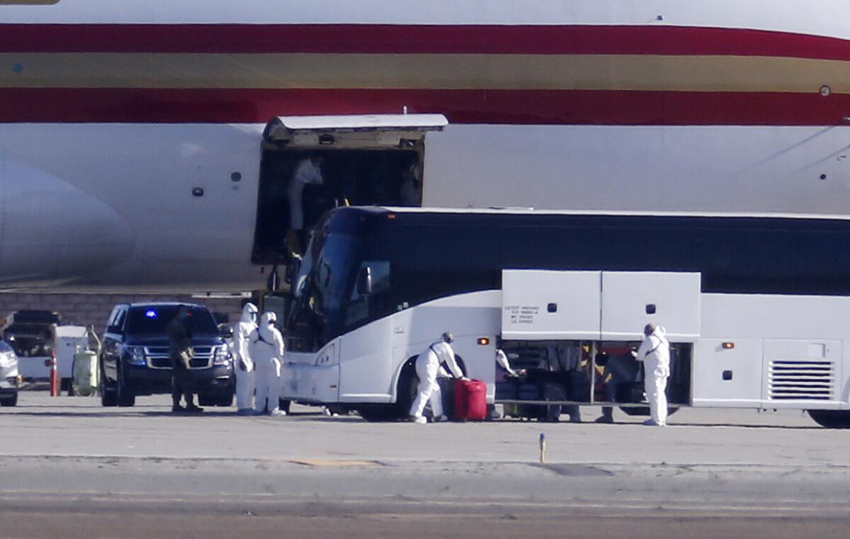 A Boeing 747 on a charter flight from Wuhan, China, arrives Wednesday at March Air Reserve Base in Riverside County.