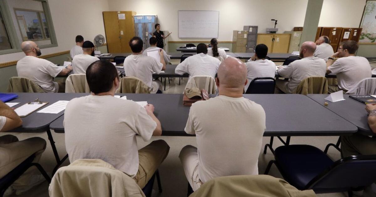 Young adults who are hostile and easily frustrated face a number of life challenges. In addition to poorer cardiovascular health, a new study has found they have poorer cognitive health at 50 as well. Pictured, inmates at a college world history class at the Monroe Correctional Complex in Monroe, Wash.