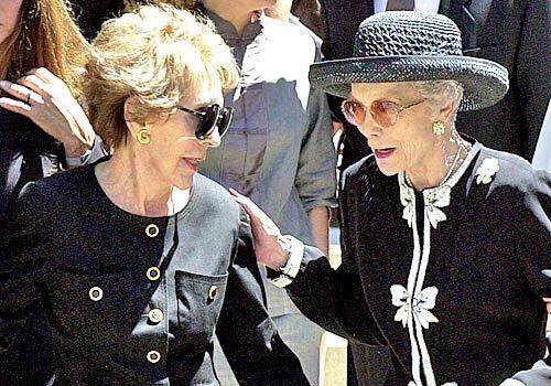 Nancy Reagan, left, and Jane Wyman talk after a memorial service in Sacramento for Wyman's daughter, Maureen Reagan, in 2001.