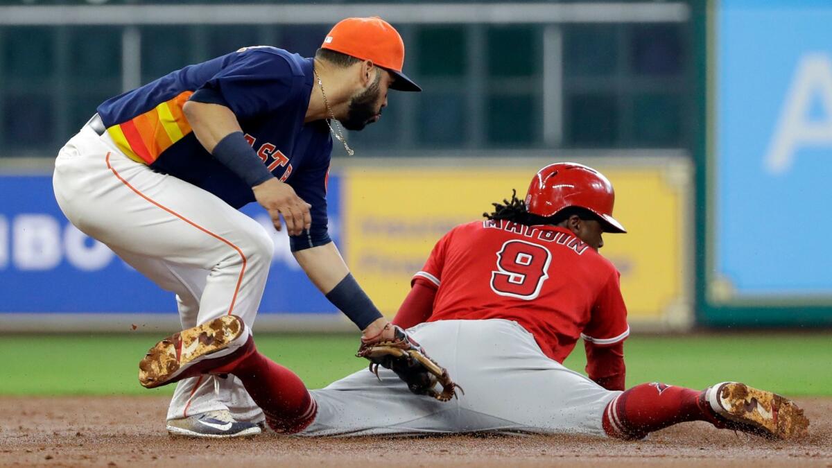 Angels' Cameron Maybin steals second base against Houston shortstop Marwin Gonzalez on June 11.
