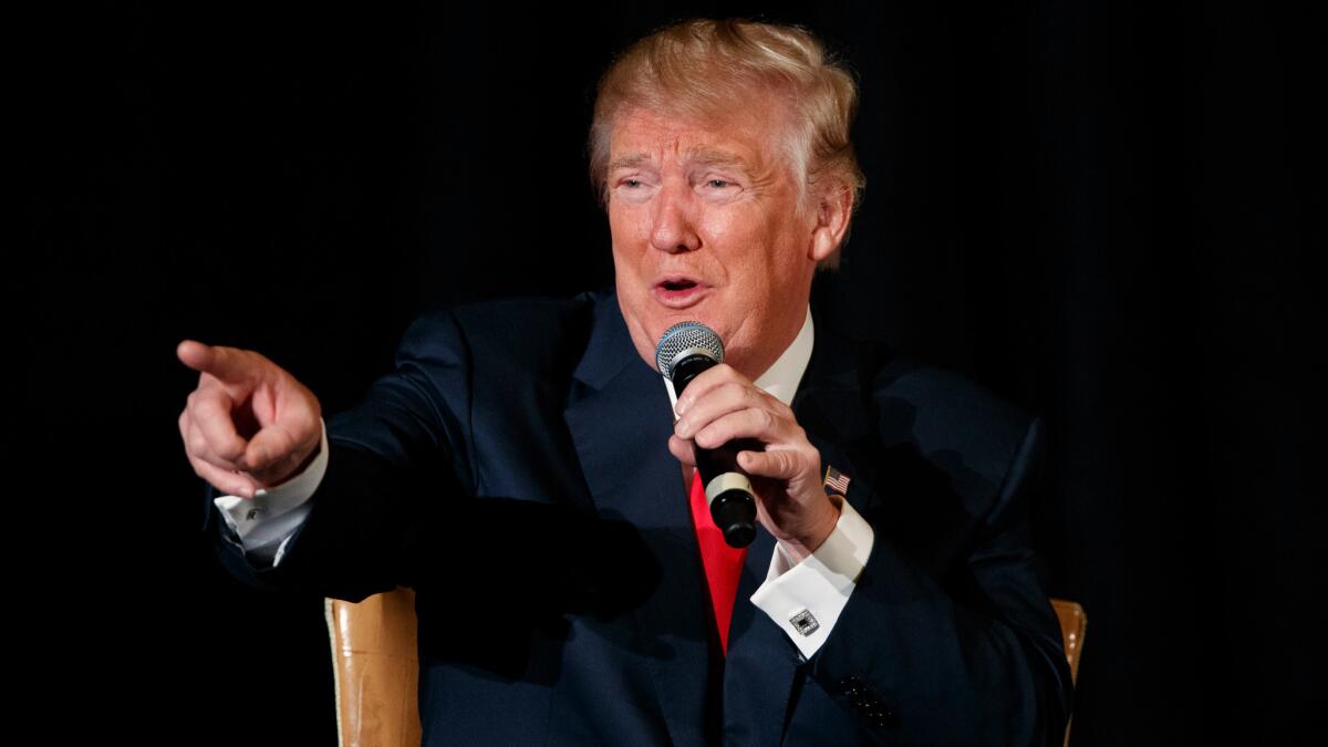 Republican presidential candidate Donald Trump speaks at a town hall event with the Retired American Warriors in Herndon, Va., on Oct. 3.