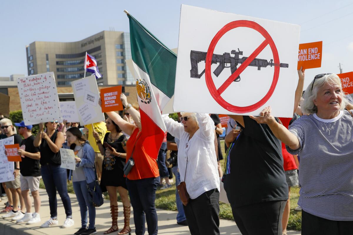 Demonstrators protest after a mass shooting