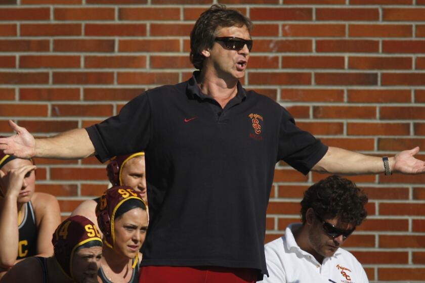 Vander Brug, Brian  B581859408Z.1 LOS ANGELES, CA  JANUARY 29 2012 USC's water polo coach Jovan Vavic roams the sidelines during a scrimmage against UCLA Sunday morning January 29 2011 at USC. Vavic has won national championships as coach of both the Trojans' men's and women's water polo teams. He is known for his fiery style, constantly stalking the pool deck, hollering and waving his arms. It works. His teams have won nine national titles.. (Brian van der Brug/Los Angeles Times)