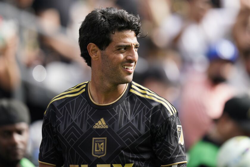 Los Angeles FC's Carlos Vela walks across the field during the second half.