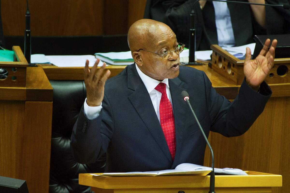 South African President Jacob Zuma answers during a session of questions to the president at the South African Parliament in Cape Town on Nov. 23.