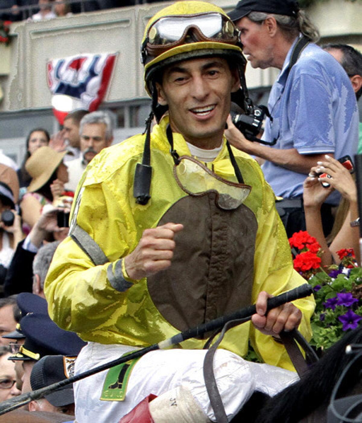 John Velazquez celebrates after riding Union Rags to victory in the Belmont Stakes last year.