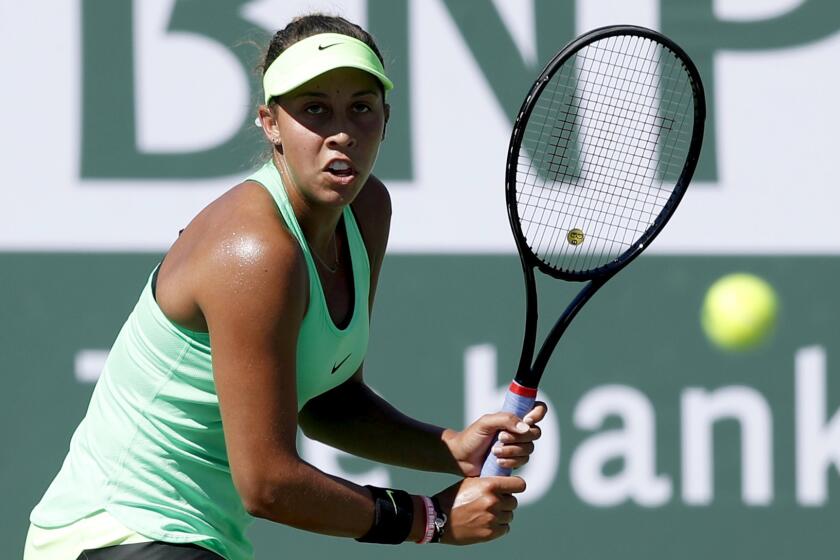 Madison Keys tracks a shot by Mariana Duque-Marino during their match at the BNP Parnibas Open on Saturday.