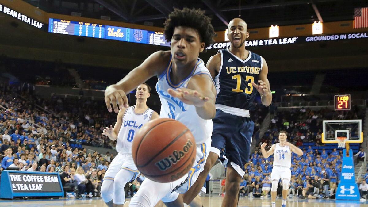 UCLA freshman guard Chris Smith loses control of the ball after stealing it from UC Irvine's Brandon Smith on Nov. 26.