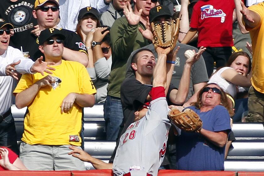 Cincinnati's Chris Heisey can't make the catch on a two-run home run by Pittsburgh's Michael McKenry back in 2013.