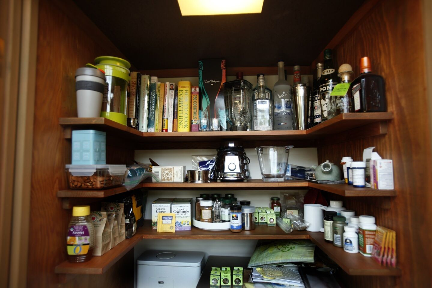 U-shaped shelves make the most of the pantry.