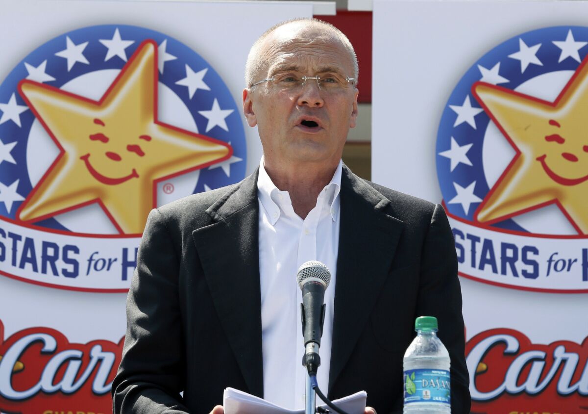 Andy Puzder, CEO of Carl's Jr. parent CKE Restaurants, at a news conference in Texas in 2014. (AP)