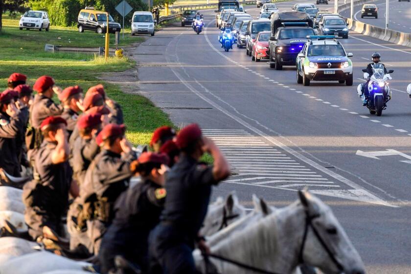 Photo released by Telam showing a convoy carrying the bodies of five Argentinians victims of October 31st bike path truck attack in New York, upon their arrival in Buenos Aires, Argentina on November 06, 2017. Five of the eight people killed in the attack were friends from Argentina celebrating the 30th anniversary of their high school graduation. / AFP PHOTO / TELAM / Fernando Gens / Argentina OUTFERNANDO GENS/AFP/Getty Images ** OUTS - ELSENT, FPG, CM - OUTS * NM, PH, VA if sourced by CT, LA or MoD **