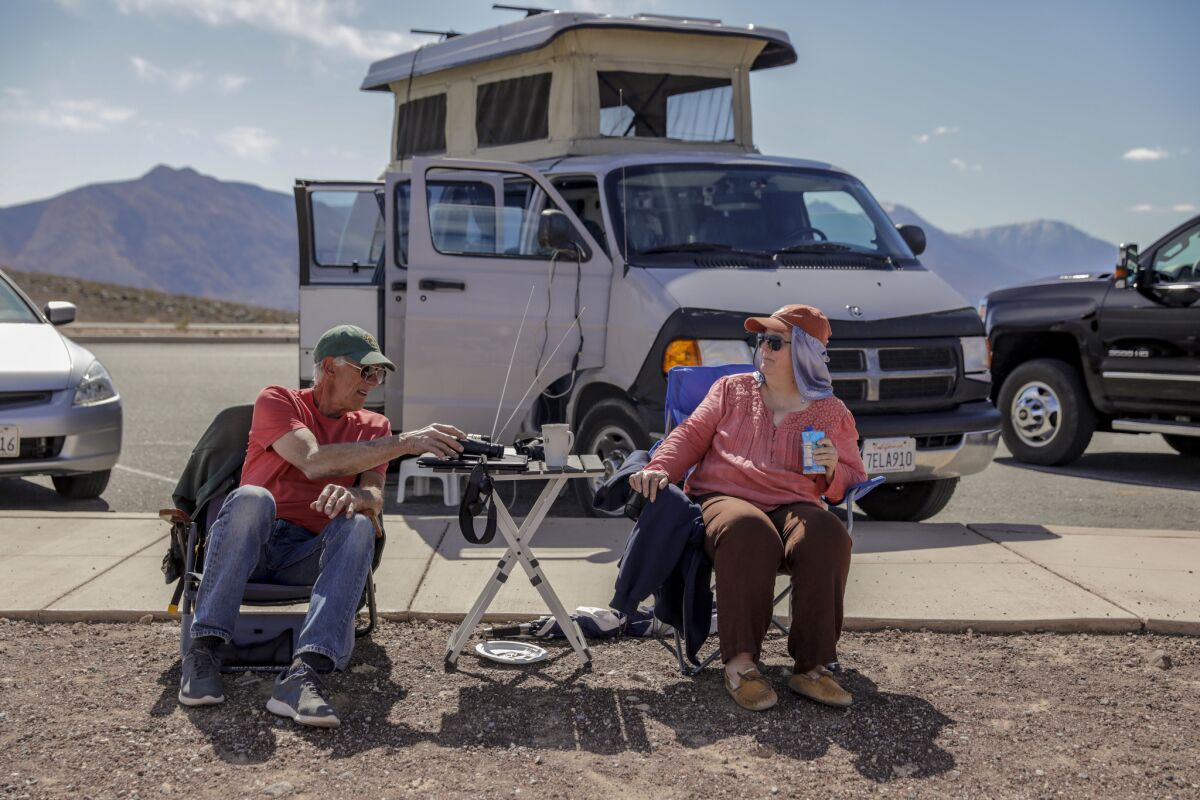 DEATH VALLEY, CA, MARCH 18, 2019 --- For six years, Richard, 71, and Candace Campbell of Pacific Cove have been making the eight hour trek, in there 2001 Dodge 2500 cargo van that was converted to a camper, to Rainbow Canyon to watch fighter jets blast through the gorge. United Air Force and Navy fighter jets train in Rainbow Canyon aka Star Wars Canyon, near the western edge of Death Valley National Park in Inyo County, California. The canyon accessed from Father Crowley Overlook off California State Route 190 gives visitors a place to witness and photograph jets flying beneath them. (Irfan Khan / Los Angeles Times)