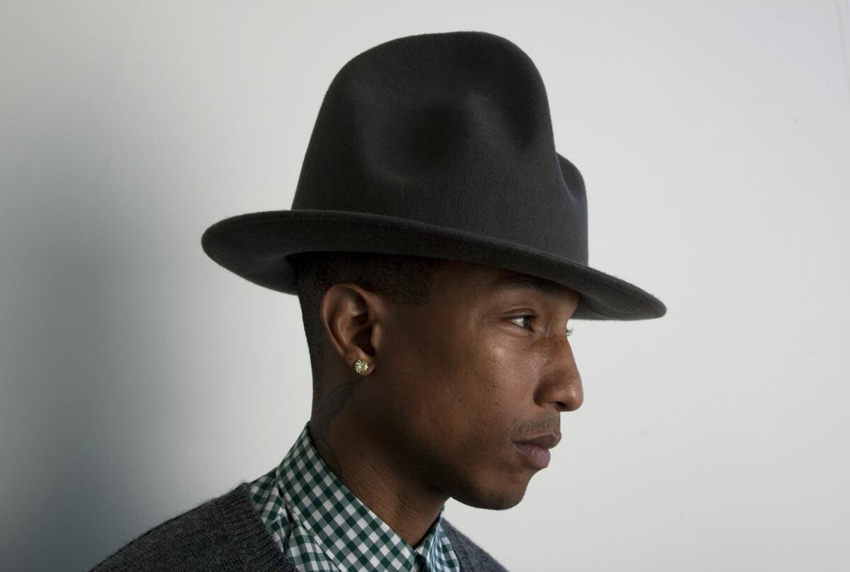 Pharrell Williams' latest endeavor is a perfume named after his new album, "Girl."