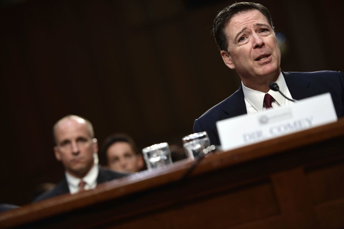 Former FBI Director James Comey testifies June 8 at a Senate Intelligence Committee hearing.