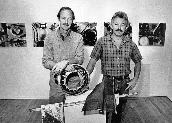 Mark Chamberlain, left, and Jerry Burchfield in 1987 with junk they collected on Laguna Canyon Road. From 1973 to 1987, they owned BC Space Gallery in Laguna Beach.