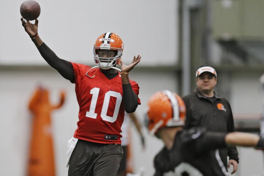 Vince Young throws a pass during a voluntary mini-camp with the Cleveland Browns in Brea, Ohio.