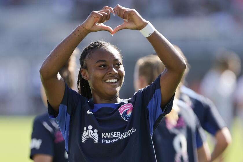 SAN DIEGO, CA - AUGUST 05, 2023: The San Diego Wave's Jaedyn Shaw makes a heart shape as she looks fans while she celebrates her goal during the first half against Angel City at Snapdragon Stadium in San Diego on Saturday, August 05, 2023. (Hayne Palmour IV / For The San Diego Union-Tribune)