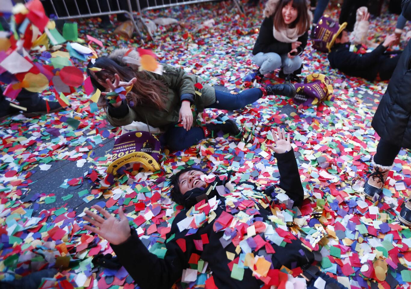 Revelers enjoy the confetti in Times Square.