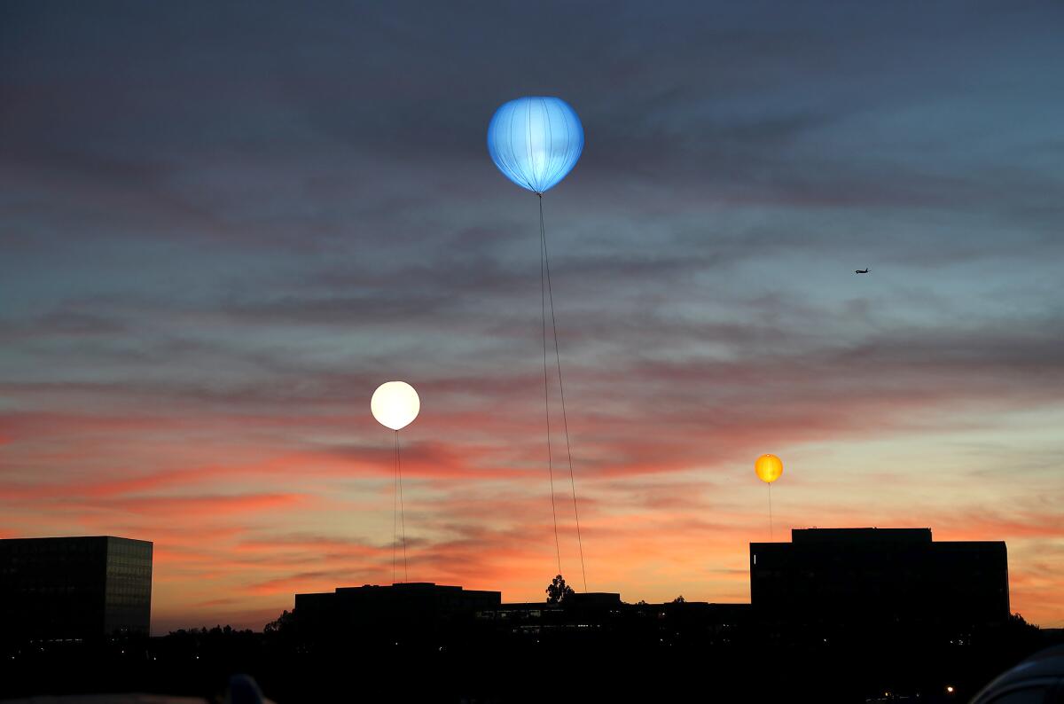 Balloons mark the locations of the buildings that will make up a UCI academic and medical health complex set to open by 2025.