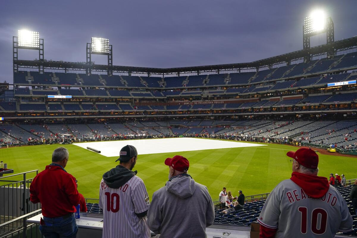 Fans arrive for Game 3 of the World Series between the Houston Astros and the Philadelphia Phillies.