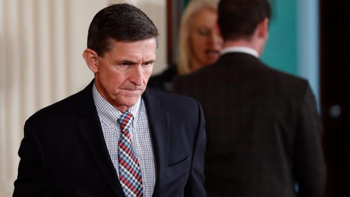 Michael Flynn arrives for a White House news conference in February before being forced out as President Trump's national security advisor. He's under investigation by special counsel Robert S. Mueller III.