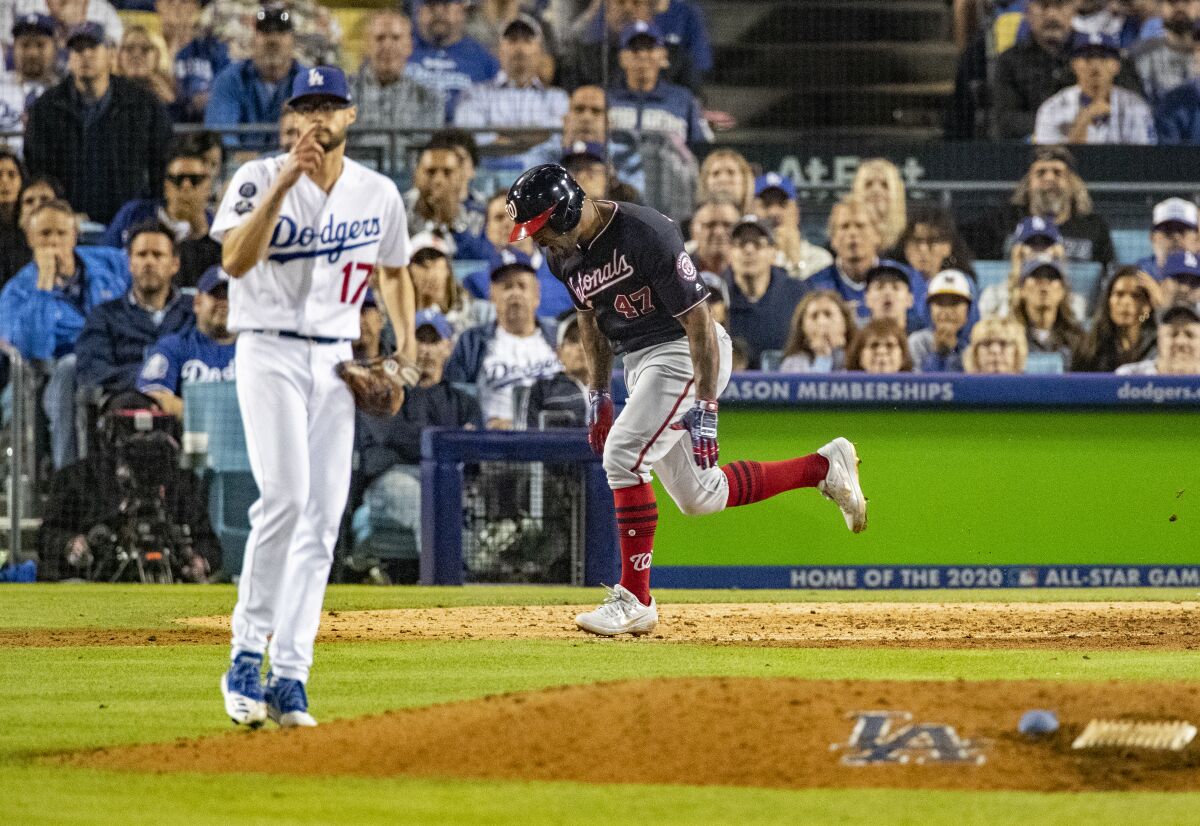 Washington Nationals first baseman Howie Kendrick hits a grand slam off Dodgers reliever Joe Kelly in the 10th inning Wednesday.