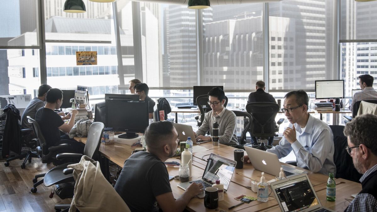 A startup's 30 employees work at a WeWork space in San Francisco in 2016. WeWork isn't just for startups, though: It's getting more and more of its business from large companies.