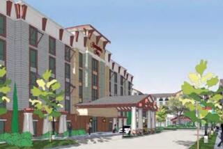An architectural rendering of the entrance to The Inns at Buena Vista Creek.