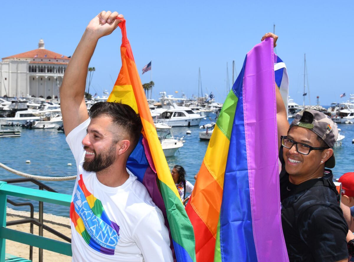 From left, Hugo Zambrano and Armond Cardenas participated in Catalina Island's inaugural Pride celebration