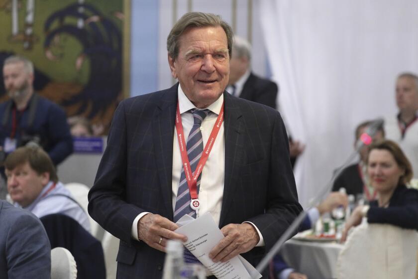 Former German Chancellor Gerhard Schroeder arrives to attend the St. Petersburg International Economic Forum in 2019. 