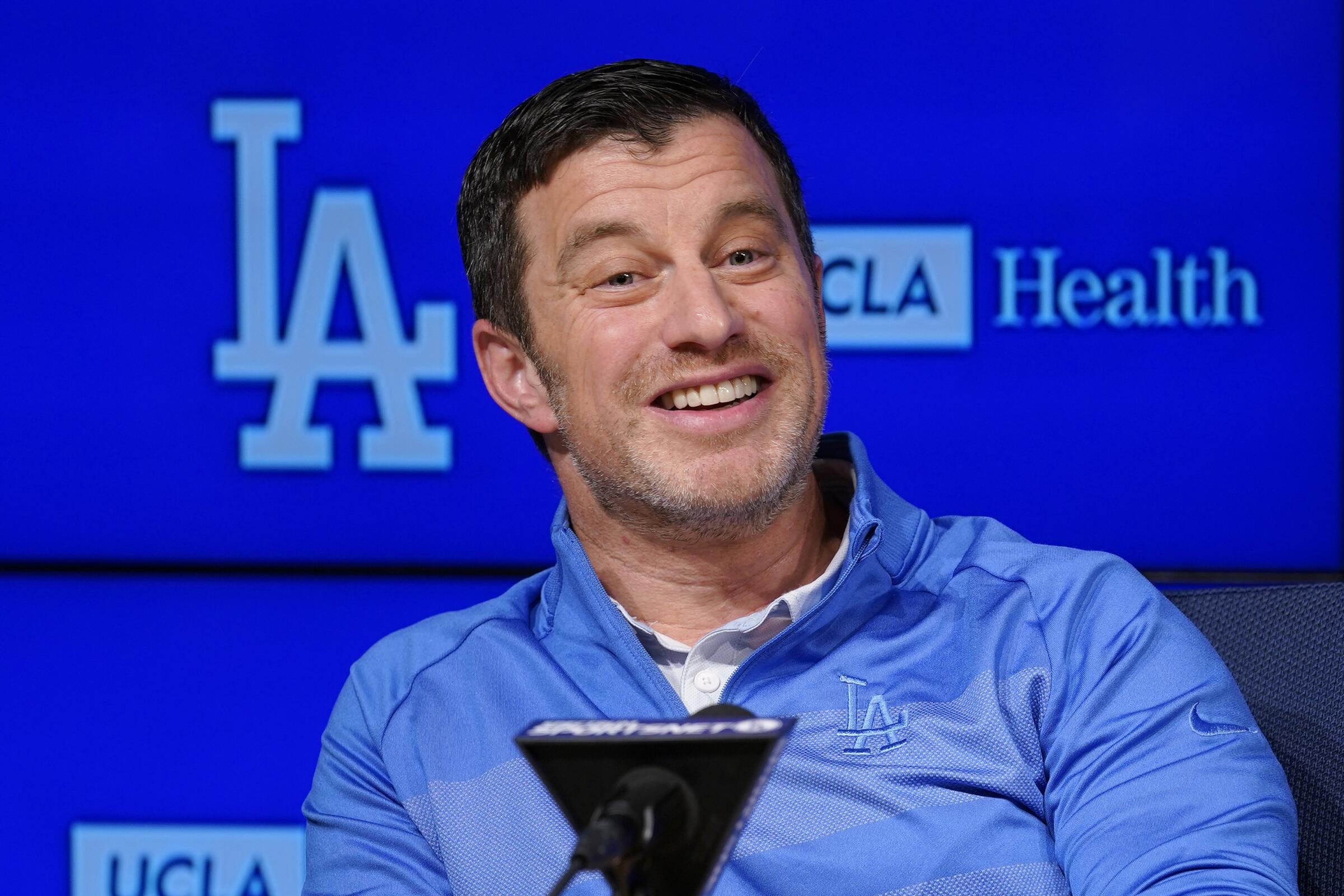 Andrew Friedman, the Dodgers' president of baseball operations, speaks during a news conference.