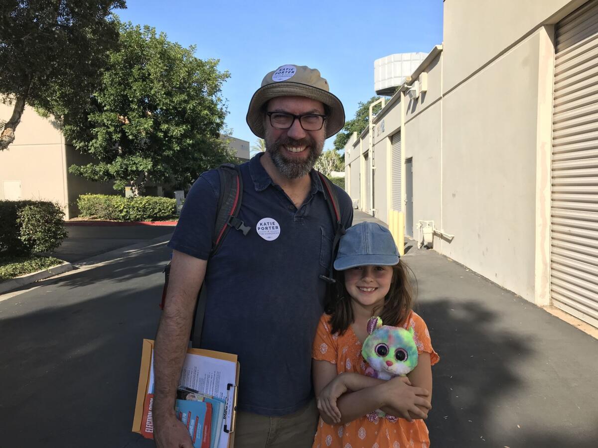 It was the first time canvassing for 49-year-old Landon Hall and for Neko Hall, 7, and her plush hamster, Neon.