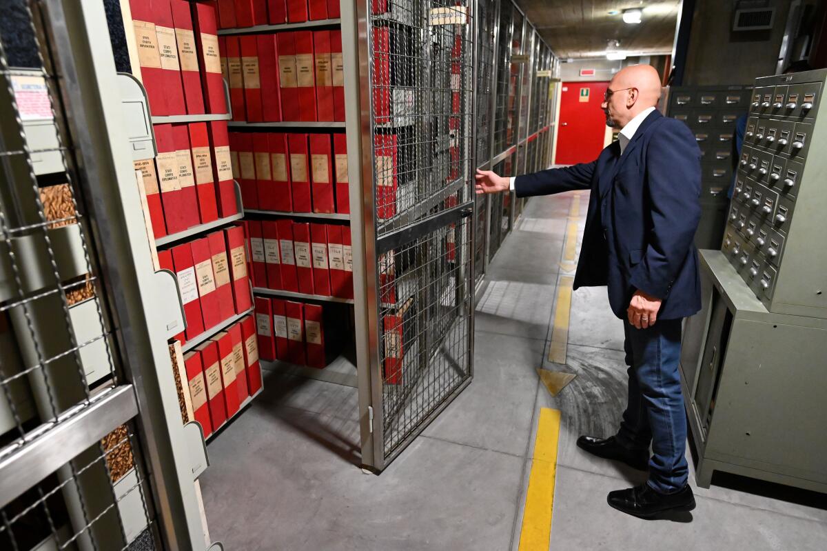 An attendant opens the section of the archive dedicated to Pope Pius XII on Friday at the Vatican. The Monday unsealing of the archives of Pius XII has been awaited for decades by Jewish groups and historians.