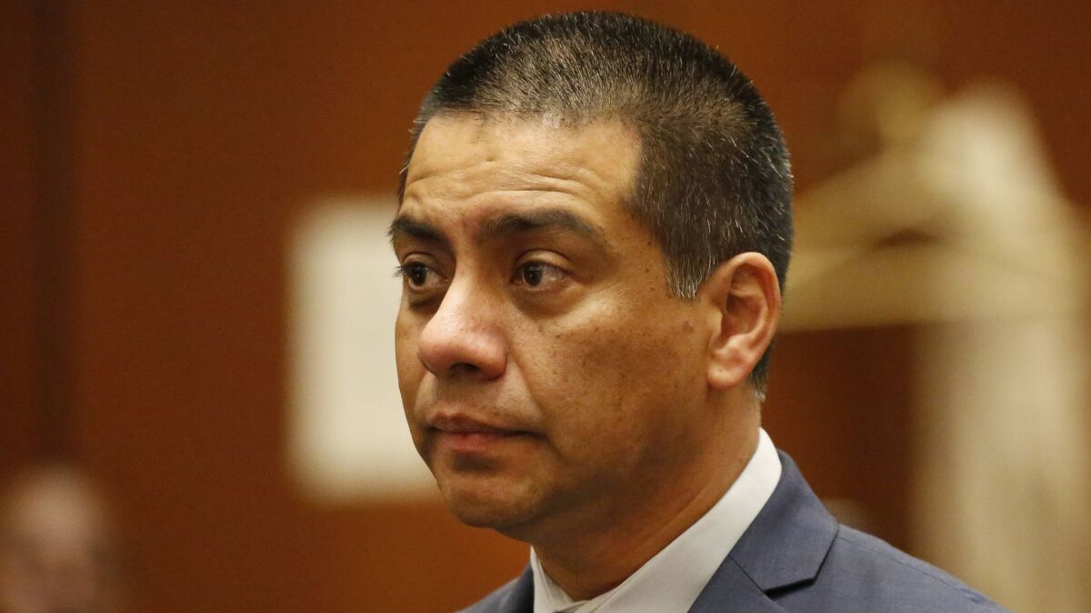 Attorneys for L.A. school board member Ref Rodriguez on Monday successfully argued for more time to prepare their defense against political money-laundering charges. Rodriguez is shown here during a previous court appearance.