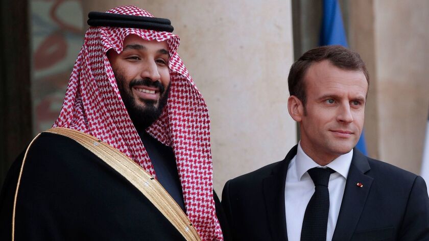 French President Emmanuel Macron, right, with Saudi Arabia's Crown Prince Mohammed bin Salman at the Elysee Palace in Paris on Tuesday.