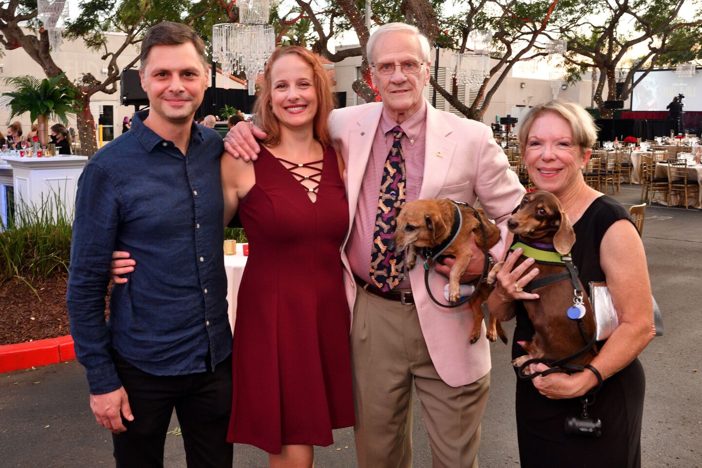 Kurt Statham; Dr. Zarah Hedge, chief medical officer of the San Diego Humane Society; Ralph Aniunas (with Remy) and Gerri Thornton (with Luca)